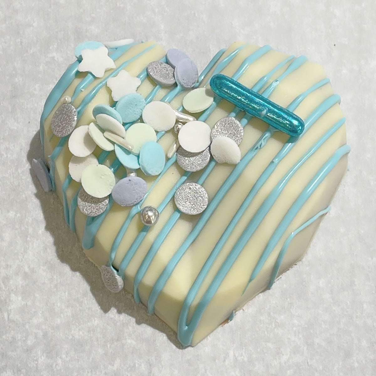 COEUR CHOCOLAT GIANDUJA BLANC ET BLEU L'Atelier des Gâteaux 