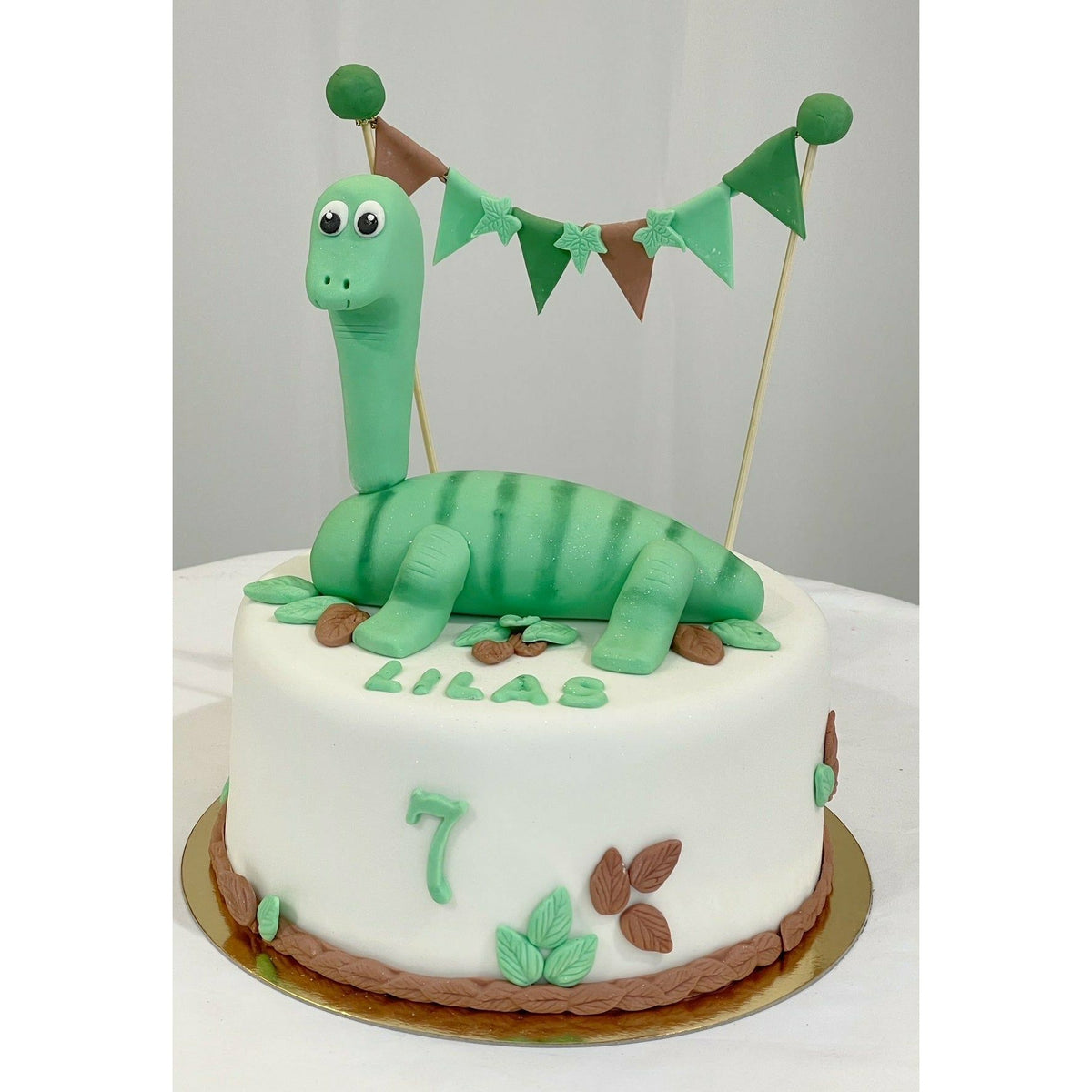 GÂTEAU DINOSAURE atelierdesgateaux.com 